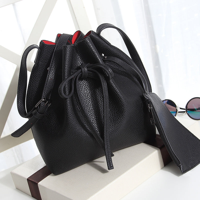 Women's diagonal pumping bucket bag