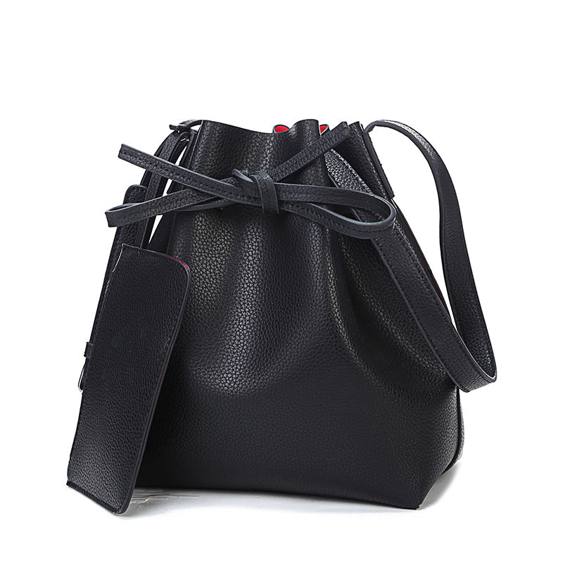 Women's diagonal pumping bucket bag