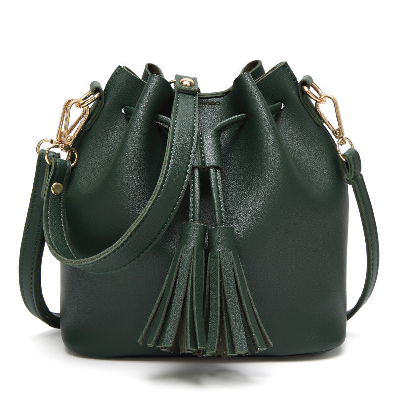 MS new Korean fashion shoulder belt buckle tassel satchel draw a bag on behalf of
