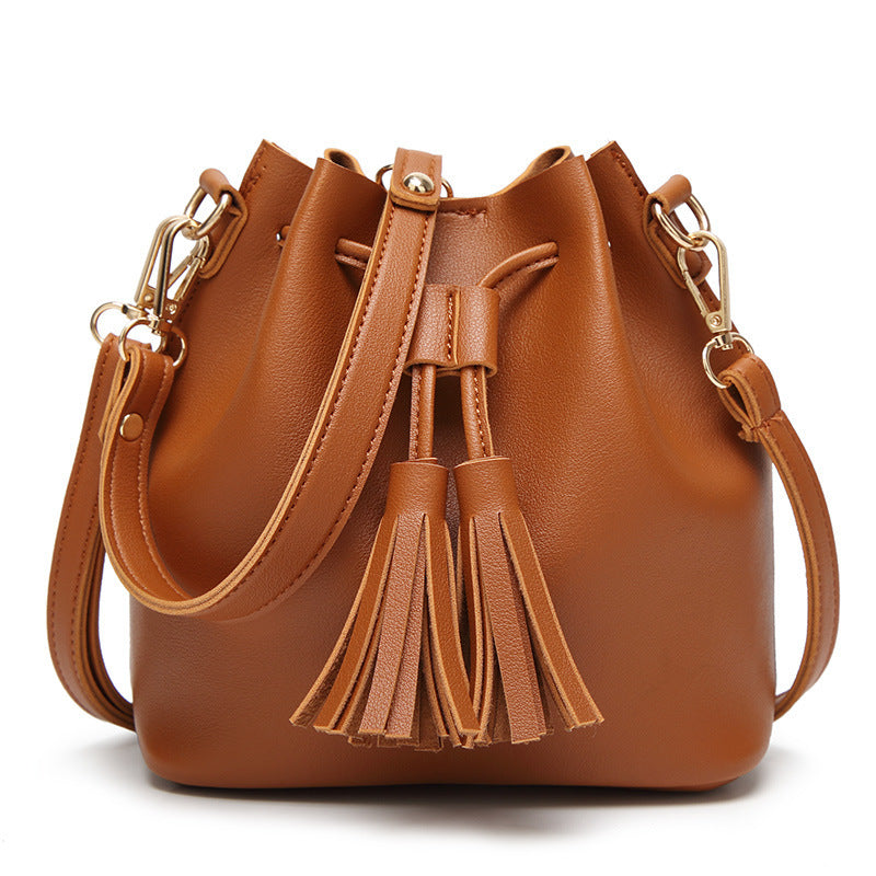 MS new Korean fashion shoulder belt buckle tassel satchel draw a bag on behalf of