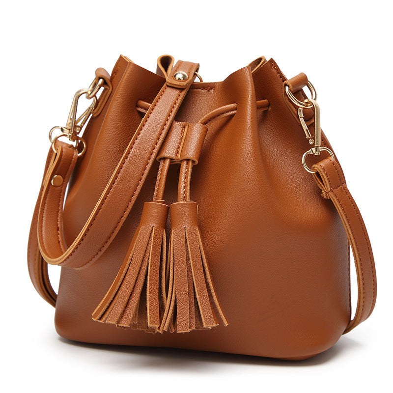 MS new Korean fashion shoulder belt buckle tassel satchel draw a bag on behalf of