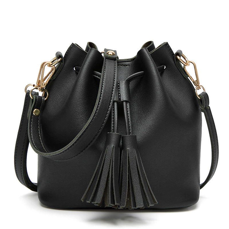 MS new Korean fashion shoulder belt buckle tassel satchel draw a bag on behalf of