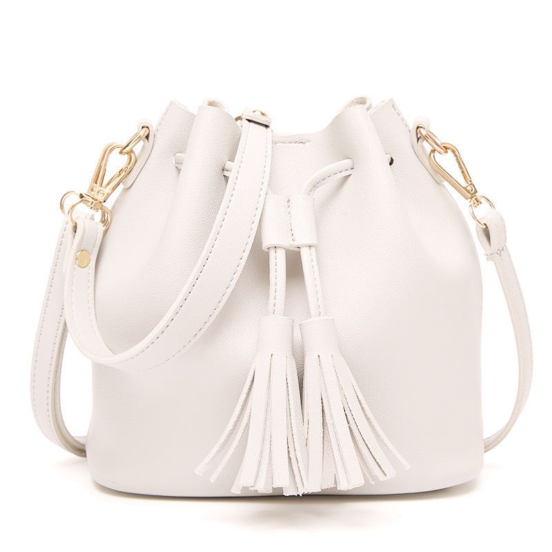 MS new Korean fashion shoulder belt buckle tassel satchel draw a bag on behalf of