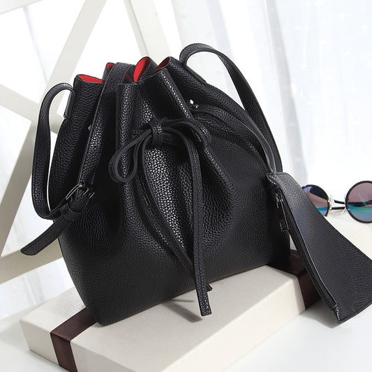 Women's diagonal pumping bucket bag