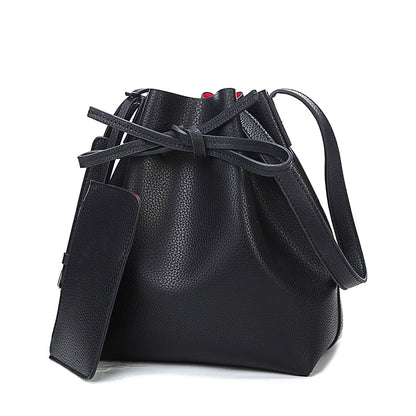 Women's diagonal pumping bucket bag
