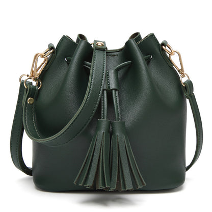 MS new Korean fashion shoulder belt buckle tassel satchel draw a bag on behalf of