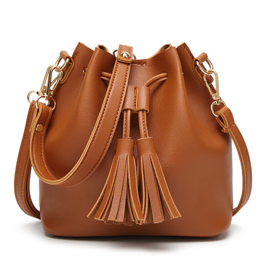 MS new Korean fashion shoulder belt buckle tassel satchel draw a bag on behalf of