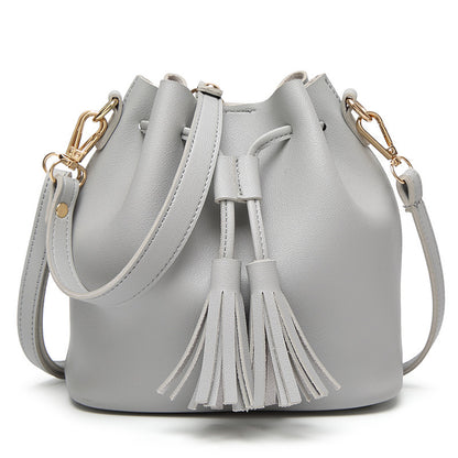 MS new Korean fashion shoulder belt buckle tassel satchel draw a bag on behalf of