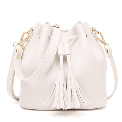 MS new Korean fashion shoulder belt buckle tassel satchel draw a bag on behalf of