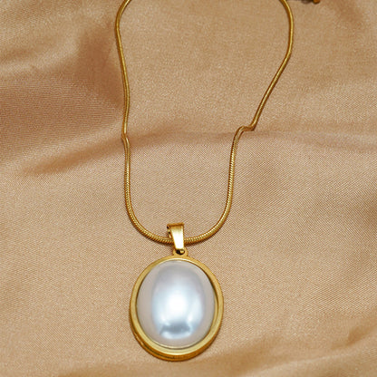 Lxalry Golden Jewelry Set - Elegant Necklace & Ring Combo With Oval Design, Metal Polished Finish, Perfect For Day & Night Occasions